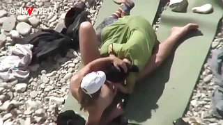 Beach Voyeur&period; Unashamed nudists having lovemaking chiefly the beach right near others